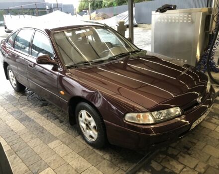 Красный Мазда 626, объемом двигателя 2 л и пробегом 190 тыс. км за 850 $, фото 1 на Automoto.ua