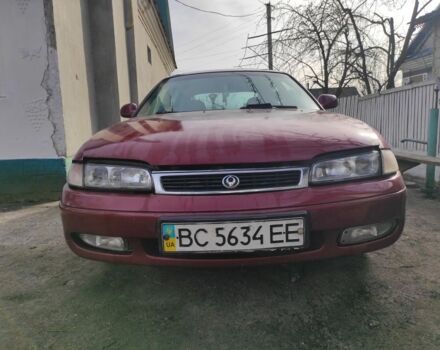 Красный Мазда 626, объемом двигателя 2 л и пробегом 364 тыс. км за 600 $, фото 1 на Automoto.ua