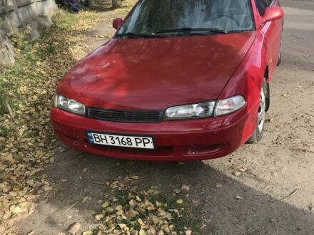 Красный Мазда 626, объемом двигателя 1.8 л и пробегом 100 тыс. км за 1600 $, фото 1 на Automoto.ua
