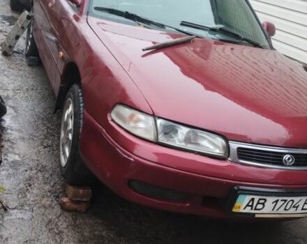 Красный Мазда 626, объемом двигателя 1.8 л и пробегом 400 тыс. км за 650 $, фото 1 на Automoto.ua