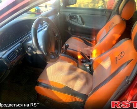 Красный Мазда 626, объемом двигателя 1.8 л и пробегом 300 тыс. км за 1600 $, фото 1 на Automoto.ua