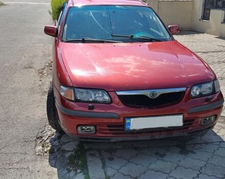 Красный Мазда 626, объемом двигателя 2 л и пробегом 400 тыс. км за 2600 $, фото 1 на Automoto.ua