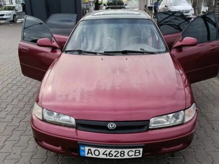 Красный Мазда 626, объемом двигателя 1.8 л и пробегом 365 тыс. км за 1800 $, фото 1 на Automoto.ua