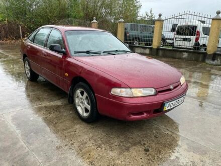 Красный Мазда 626, объемом двигателя 1.8 л и пробегом 200 тыс. км за 1200 $, фото 1 на Automoto.ua