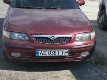 Красный Мазда 626, объемом двигателя 1.8 л и пробегом 400 тыс. км за 3300 $, фото 1 на Automoto.ua