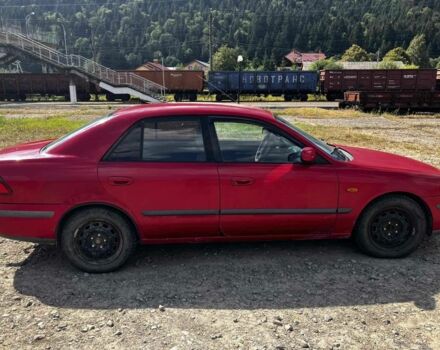 Красный Мазда 626, объемом двигателя 2 л и пробегом 343 тыс. км за 2300 $, фото 1 на Automoto.ua