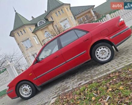 Красный Мазда 626, объемом двигателя 2 л и пробегом 111 тыс. км за 1800 $, фото 1 на Automoto.ua