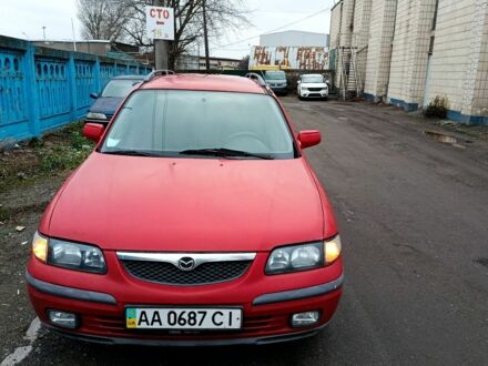 Красный Мазда 626, объемом двигателя 2 л и пробегом 122 тыс. км за 2010 $, фото 1 на Automoto.ua