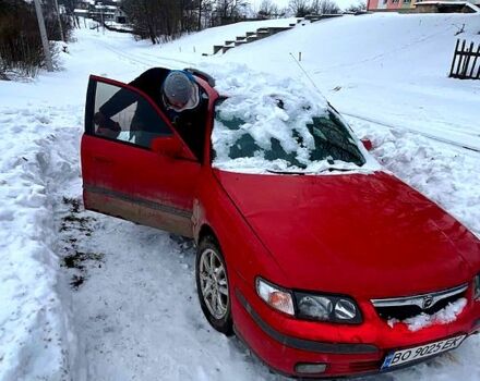 Красный Мазда 626, объемом двигателя 2 л и пробегом 100 тыс. км за 800 $, фото 1 на Automoto.ua