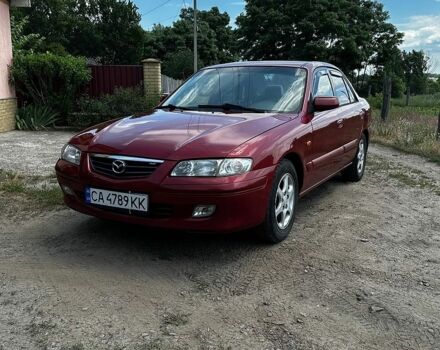 Красный Мазда 626, объемом двигателя 2 л и пробегом 300 тыс. км за 3250 $, фото 1 на Automoto.ua