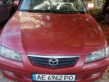 Червоний Мазда 626, об'ємом двигуна 2 л та пробігом 270 тис. км за 2599 $, фото 1 на Automoto.ua