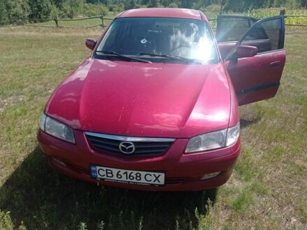 Красный Мазда 626, объемом двигателя 1.8 л и пробегом 329 тыс. км за 2700 $, фото 1 на Automoto.ua