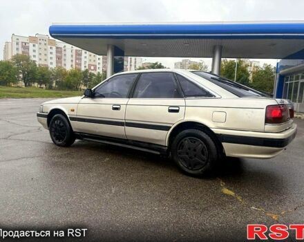 Мазда 626, объемом двигателя 2 л и пробегом 300 тыс. км за 1000 $, фото 2 на Automoto.ua