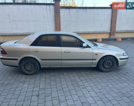 Мазда 626, объемом двигателя 2 л и пробегом 360 тыс. км за 1800 $, фото 6 на Automoto.ua