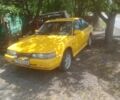 Желтый Мазда 626, объемом двигателя 2 л и пробегом 400 тыс. км за 895 $, фото 1 на Automoto.ua