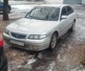 Серый Мазда 626, объемом двигателя 2 л и пробегом 250 тыс. км за 566 $, фото 1 на Automoto.ua