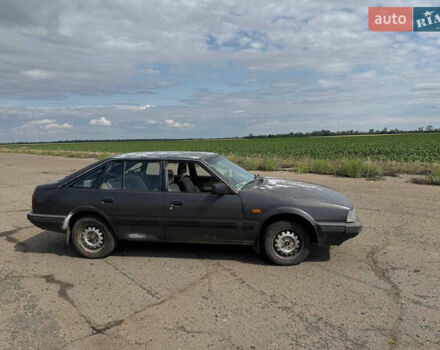 Сірий Мазда 626, об'ємом двигуна 2 л та пробігом 650 тис. км за 479 $, фото 4 на Automoto.ua