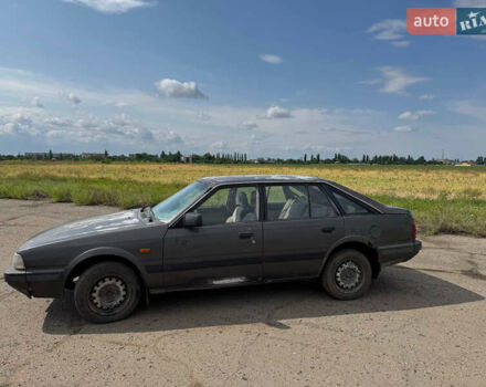 Сірий Мазда 626, об'ємом двигуна 2 л та пробігом 650 тис. км за 479 $, фото 1 на Automoto.ua