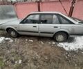 Серый Мазда 626, объемом двигателя 2 л и пробегом 310 тыс. км за 1 $, фото 1 на Automoto.ua