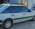 Серый Мазда 626, объемом двигателя 2 л и пробегом 94 тыс. км за 1000 $, фото 1 на Automoto.ua
