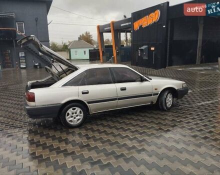 Серый Мазда 626, объемом двигателя 2 л и пробегом 343 тыс. км за 1273 $, фото 2 на Automoto.ua