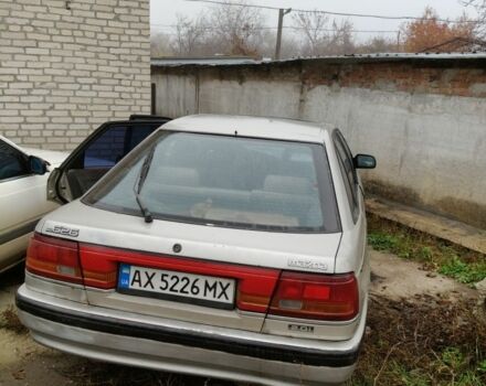 Серый Мазда 626, объемом двигателя 2 л и пробегом 300 тыс. км за 1200 $, фото 2 на Automoto.ua