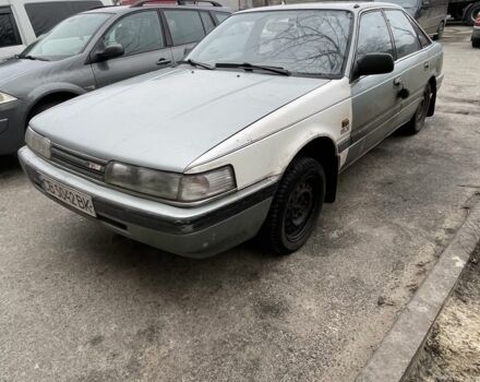 Серый Мазда 626, объемом двигателя 2 л и пробегом 30 тыс. км за 946 $, фото 1 на Automoto.ua