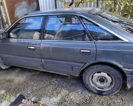 Серый Мазда 626, объемом двигателя 2 л и пробегом 396 тыс. км за 800 $, фото 2 на Automoto.ua