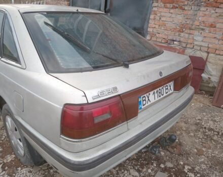 Серый Мазда 626, объемом двигателя 2 л и пробегом 320 тыс. км за 1079 $, фото 1 на Automoto.ua