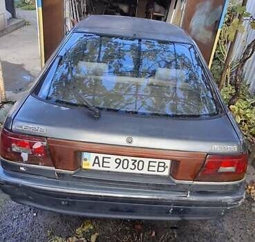 Серый Мазда 626, объемом двигателя 2 л и пробегом 396 тыс. км за 800 $, фото 1 на Automoto.ua