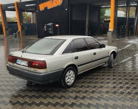 Серый Мазда 626, объемом двигателя 2 л и пробегом 343 тыс. км за 1273 $, фото 3 на Automoto.ua