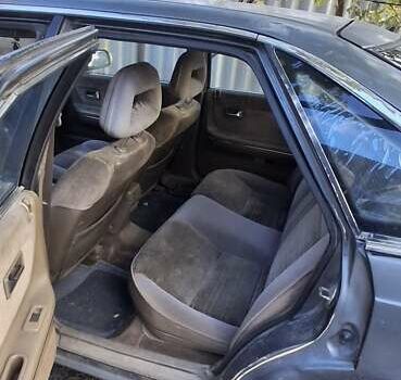 Серый Мазда 626, объемом двигателя 2 л и пробегом 396 тыс. км за 800 $, фото 4 на Automoto.ua