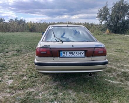 Серый Мазда 626, объемом двигателя 2 л и пробегом 320 тыс. км за 2022 $, фото 2 на Automoto.ua