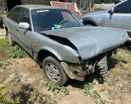 Серый Мазда 626, объемом двигателя 1.8 л и пробегом 300 тыс. км за 399 $, фото 1 на Automoto.ua