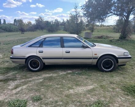 Серый Мазда 626, объемом двигателя 2 л и пробегом 320 тыс. км за 2022 $, фото 3 на Automoto.ua