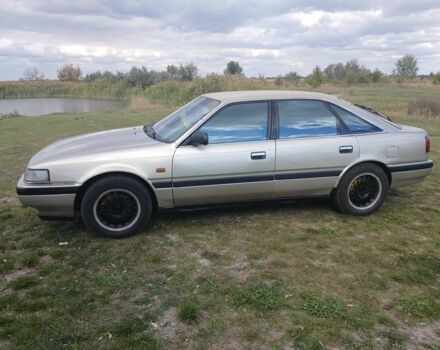 Серый Мазда 626, объемом двигателя 2 л и пробегом 320 тыс. км за 2022 $, фото 1 на Automoto.ua