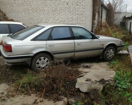 Серый Мазда 626, объемом двигателя 2 л и пробегом 300 тыс. км за 1200 $, фото 1 на Automoto.ua