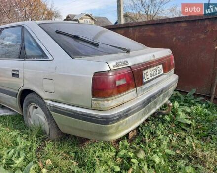 Серый Мазда 626, объемом двигателя 2 л и пробегом 500 тыс. км за 600 $, фото 4 на Automoto.ua