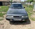 Серый Мазда 626, объемом двигателя 2 л и пробегом 1000 тыс. км за 1000 $, фото 1 на Automoto.ua