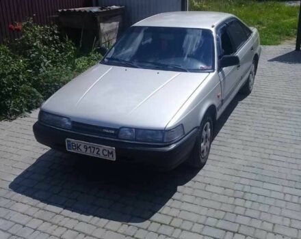 Серый Мазда 626, объемом двигателя 2 л и пробегом 360 тыс. км за 1000 $, фото 1 на Automoto.ua