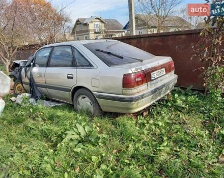 Серый Мазда 626, объемом двигателя 2 л и пробегом 500 тыс. км за 600 $, фото 5 на Automoto.ua