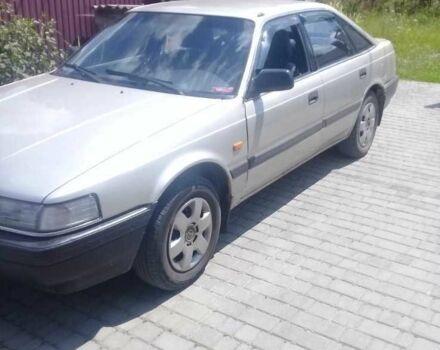 Серый Мазда 626, объемом двигателя 2 л и пробегом 360 тыс. км за 1000 $, фото 2 на Automoto.ua