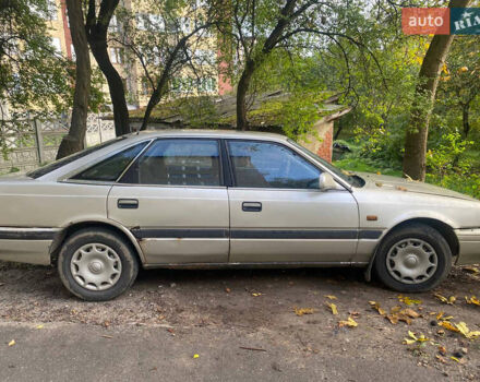 Серый Мазда 626, объемом двигателя 2 л и пробегом 355 тыс. км за 1000 $, фото 2 на Automoto.ua