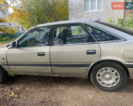 Серый Мазда 626, объемом двигателя 2 л и пробегом 355 тыс. км за 1000 $, фото 3 на Automoto.ua