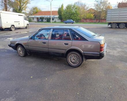 Серый Мазда 626, объемом двигателя 2 л и пробегом 200 тыс. км за 750 $, фото 2 на Automoto.ua