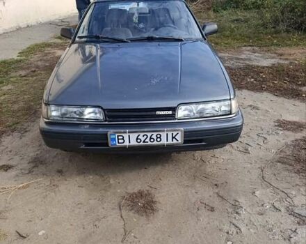 Серый Мазда 626, объемом двигателя 2 л и пробегом 430 тыс. км за 1200 $, фото 1 на Automoto.ua