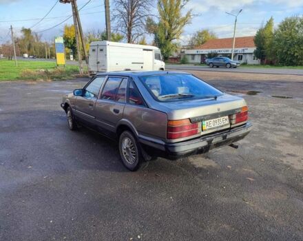 Серый Мазда 626, объемом двигателя 2 л и пробегом 200 тыс. км за 750 $, фото 4 на Automoto.ua