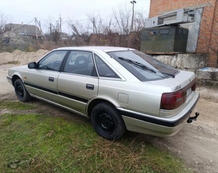 Серый Мазда 626, объемом двигателя 2 л и пробегом 280 тыс. км за 1300 $, фото 3 на Automoto.ua