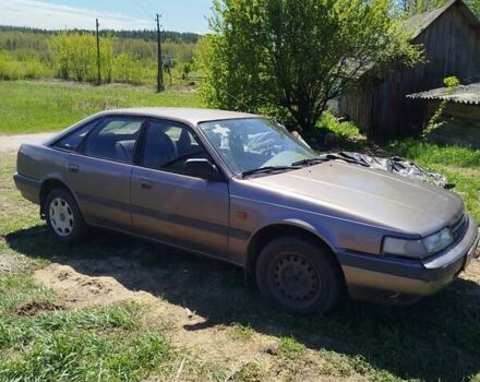 Серый Мазда 626, объемом двигателя 2 л и пробегом 260 тыс. км за 1000 $, фото 3 на Automoto.ua
