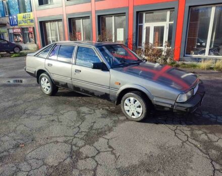 Серый Мазда 626, объемом двигателя 2 л и пробегом 200 тыс. км за 750 $, фото 1 на Automoto.ua